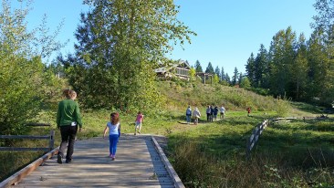 Photo of people walking on trails at Sehmel Homestead Park